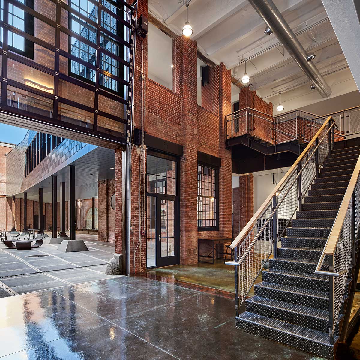 Eclectic industrial design of a apartment building stairwell